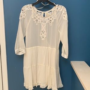 New without tag. Free people boho chic ivory dress with lace detail.